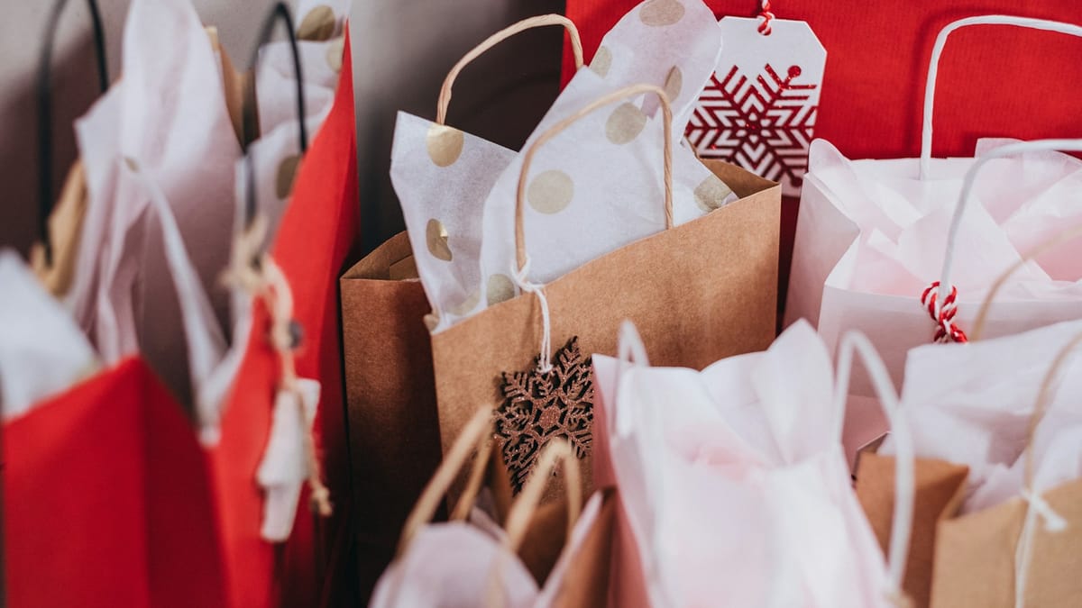Paper shopping bags lined up after a sale